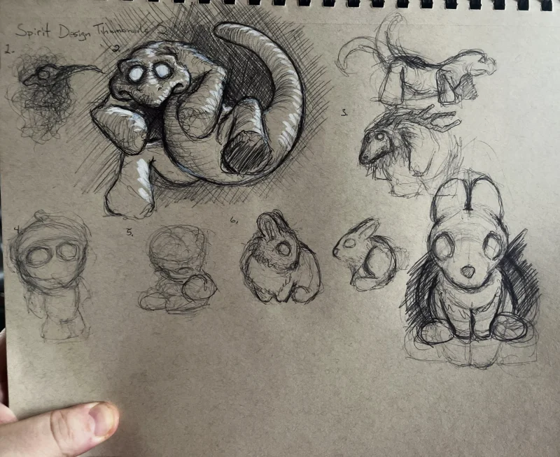 Pen studies of rounded spirits, including a mushroom-capped guide and larger curled forms.